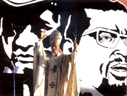 John paul II in front of a communist billboard